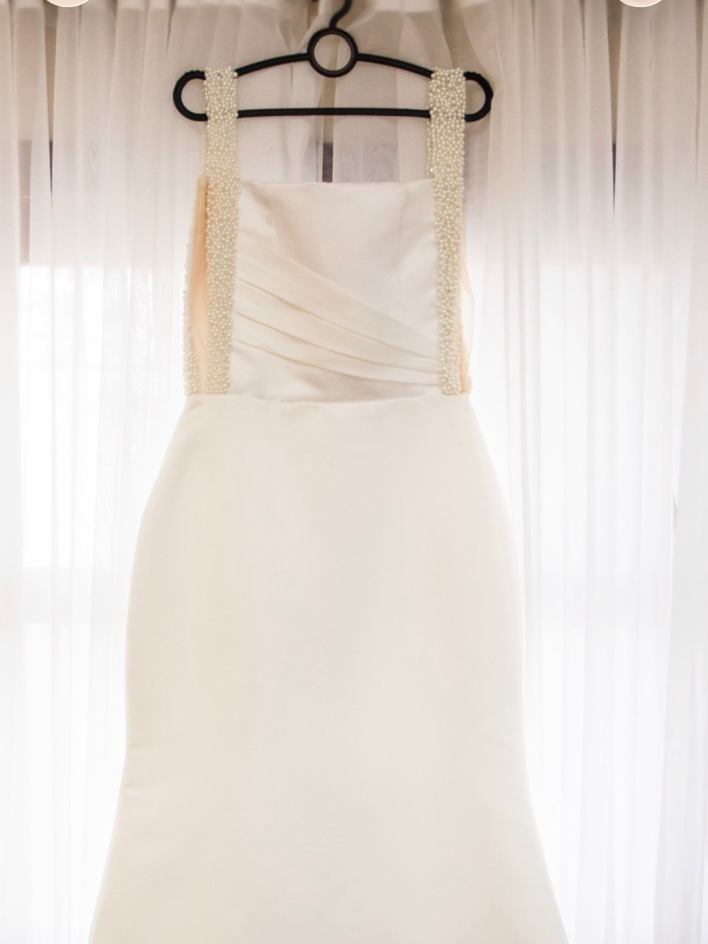 Elegant wedding dress with pearl and Swarovski beadwork on the straps